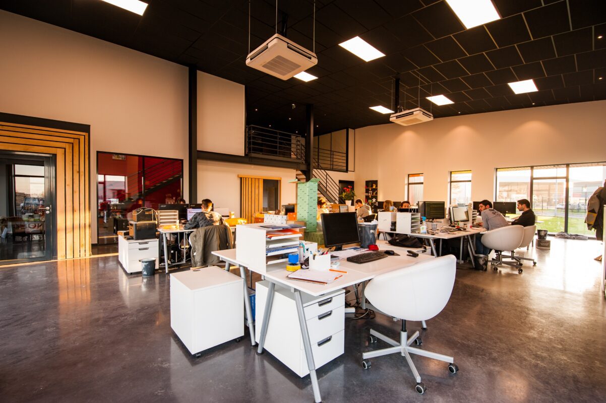 A group of people in an office setting.