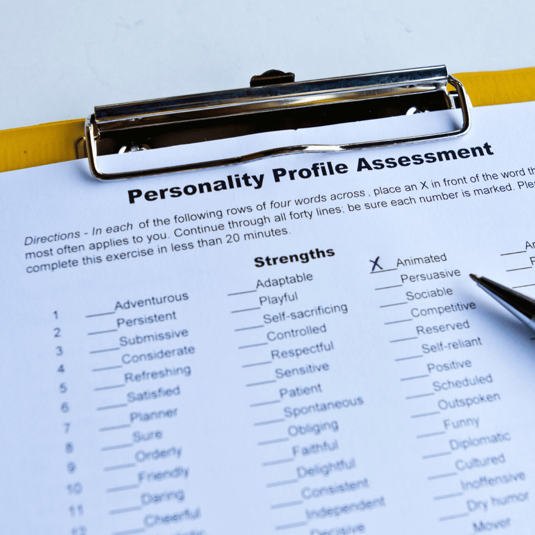 A clipboard with a pen and some type of assessment.