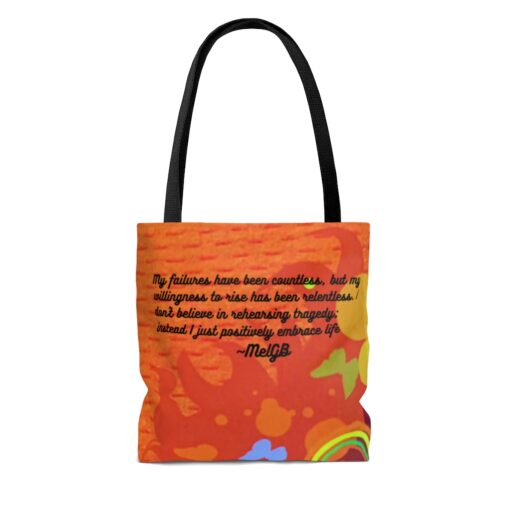 A bag with an orange background and a quote.