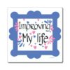 A blue and white picture frame with the words " improving my life ".