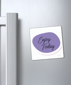 A refrigerator magnet that says " enjoy today ".