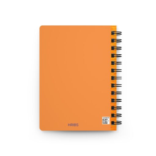 A notebook with orange cover and black spiral.