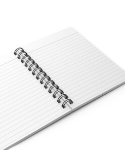 A spiral notebook with lined paper on top of it.