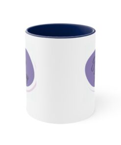 A blue and white mug with the word " you " on it.