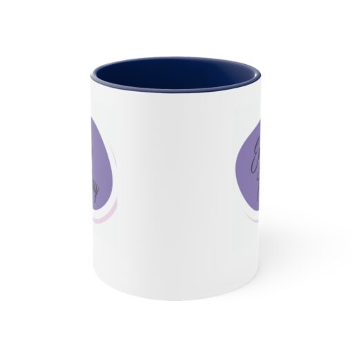 A blue and white mug with the word " you " on it.