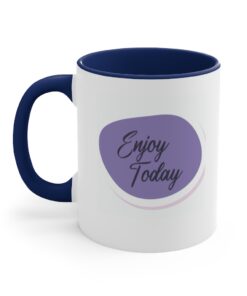 A blue and white coffee mug with the words 